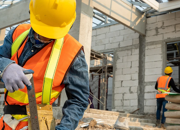 Arbeitskleidung Bau und Warnkleidung